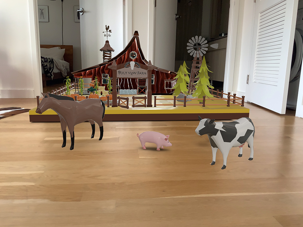 Screenshot of AR sceen with multiple virtual toy farm objects arranged.
